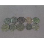 Ten Roman bronze coins