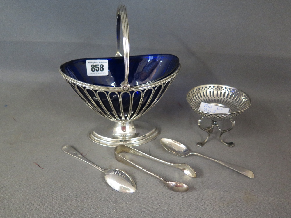 A silver basket with blue glass liner - London 1919  C & S Co Ltd and a small silver stand, two