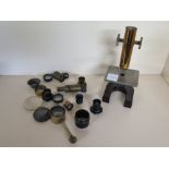 A collection of microscope spare parts a