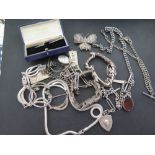 An assortment of silver and white metal