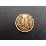 A 2002 Queen Elizabeth Sovereign coin -