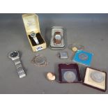 A collection of silver jewellery and man