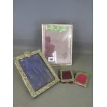 Four silver photo frames - Largest 22 cm