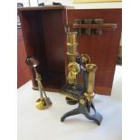 All brass boxed Microscope by Baker of L