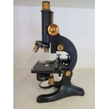 A Becks 29 black and brass Microscope