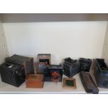 Four vintage plate Cameras and accessori