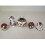 Four mini Royal Crown Derby paperweights