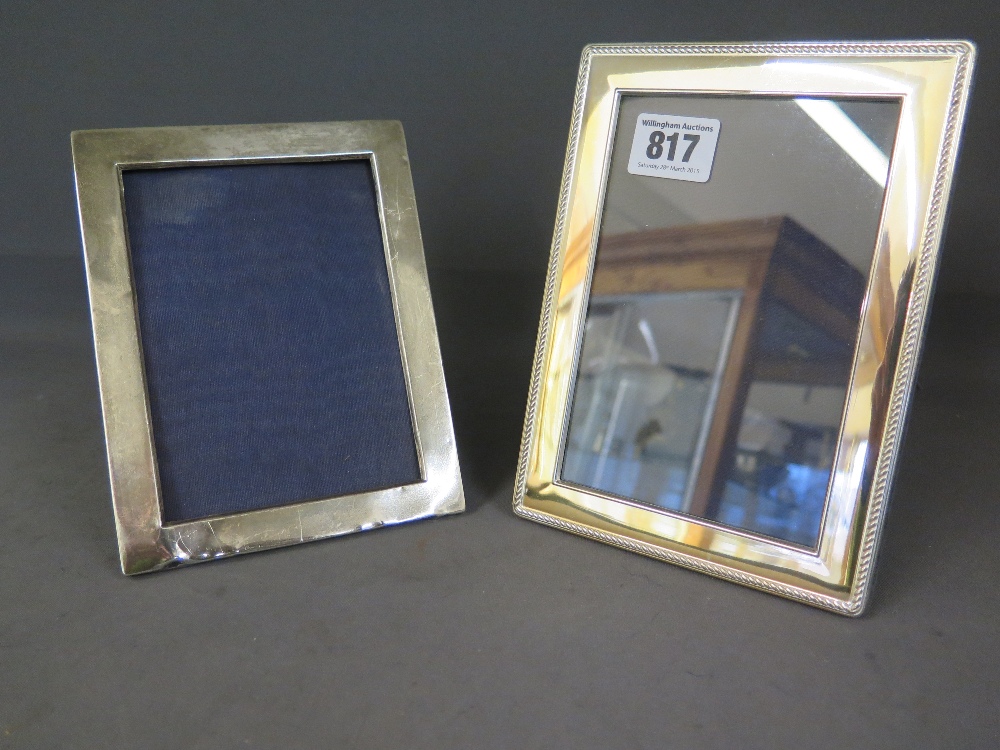 A modern silver picture frame - 18 cm x