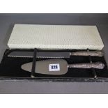 A boxed silver handled Kings pattern kni