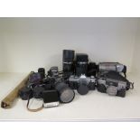 A case containing a quantity of cameras