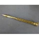 A gold plated propelling pencil and pen