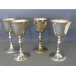 A set of four silver goblets with balust