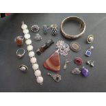 An assortment of silver and costume jewe