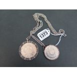 Two silver coin pendants  - To include a