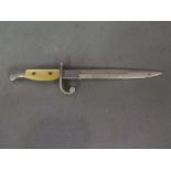 A souvenir bayonet letter opener engrave