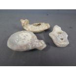 Three ancient Roman terracotta oil lamps