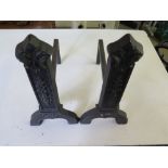 A pair of cast iron fire dogs - Height 3