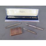 A Mordan & Co silver pencil, a silver to