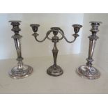 A pair of Sheffield plate candlesticks -