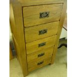 An ex display oak five drawer tallboy - Height 101 cm x Width 57cm x Depth 42cm