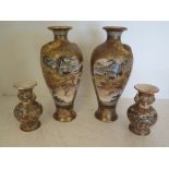 Two pairs of Satsuma vases, one pair with dragon relief decoration standing 25 cm tall, signed to