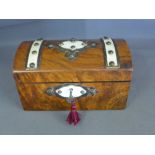 A Victorian walnut dome top box with Gothic brass and ivorine mounts, the interior fitted with a