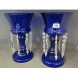 A pair of Reproduction Bristol blue lustre's each with eight hangers - Height 31 cm - maximum