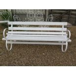 A white painted vintage garden bench