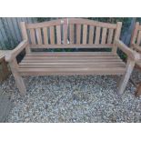 A Bramblecrest curved back three seat bench