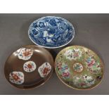 Three Oriental hand painted saucers