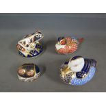 A group of four Royal Crown Derby paperweight including a frog with silver stopper, Duck with