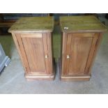 A pair of pine bedside cupboards