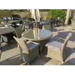 A Bramblecrest Foxham round table 120 cm with four Sahara side chairs with cushions, a 2.7 m