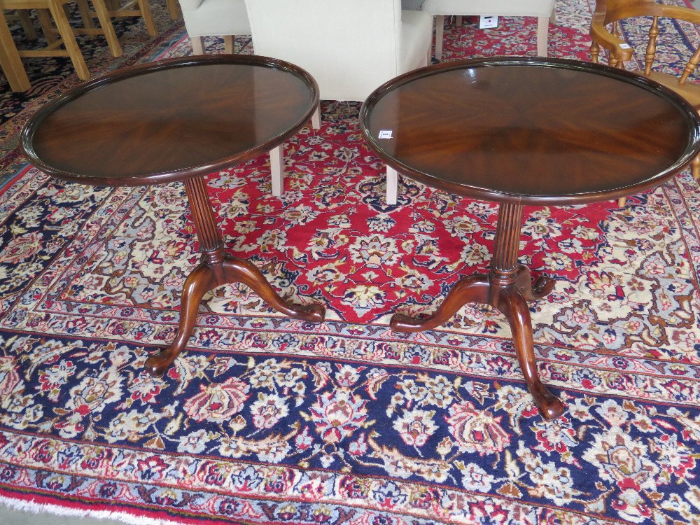 A pair of Multiyork mahogany wine table