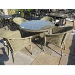 A Bramblecrest Foxham round table 120 cm and four Foxham Bistro chairs with no cushions