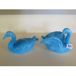 A pair of Japanese Studio Pottery models of water fowl covered in a turquoise glaze, signed to base