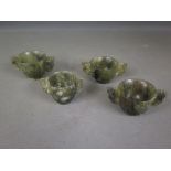 Four Oriental carved green spinach steatite twin handle miniature libation cups - Height 4 cm x