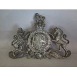 A cast iron Royal Coat of Arms - Width 28 cm