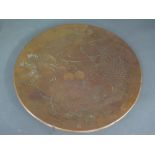 A signed Oriental bronze dish with carp - Diameter 30 cm