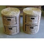 A pair of round wicker arrow weave two drawer storage units