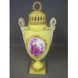 A yellow ground Meissen twin handled urn shaped pot-pouri lidded vase with blue swords mark -