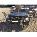 A Bramblecrest Rome elliptical table 167cm x 112cm with six stacking armchairs, seat pads and