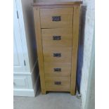 An oak ex display five drawer tall boy - Height 130 cm x Width 55 cm x Depth 40 cm