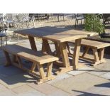 A Bramblecrest Kuta table 180cm long with two benches