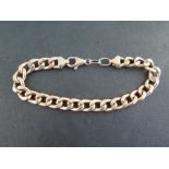 A 9ct gold curb-link bracelet - Hallmarked London - Length 22cms - Weight approx 11.4gms
Condition