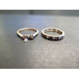 A 9ct gold garnet and white-gem full circle band ring - Hallmarked Birmingham - Ring size P 1/2 -