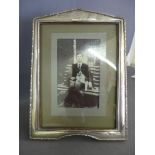 A silver hallmarked photo frame - Hallmarked for Birmingham 1921 - 22