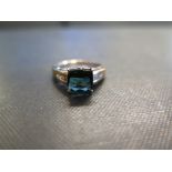 An 18ct gold indicolite tourmaline and diamond dress ring - Hallmarked Birmingham - Ring size O -