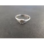 A diamond dress ring - The rectangular-shape diamond to the rose-cut diamond trefoil shoulders and