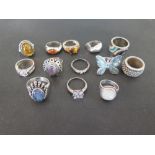 An assortment of thirteen dress rings - With marks indicating silver - Weight approx 2.8ozt